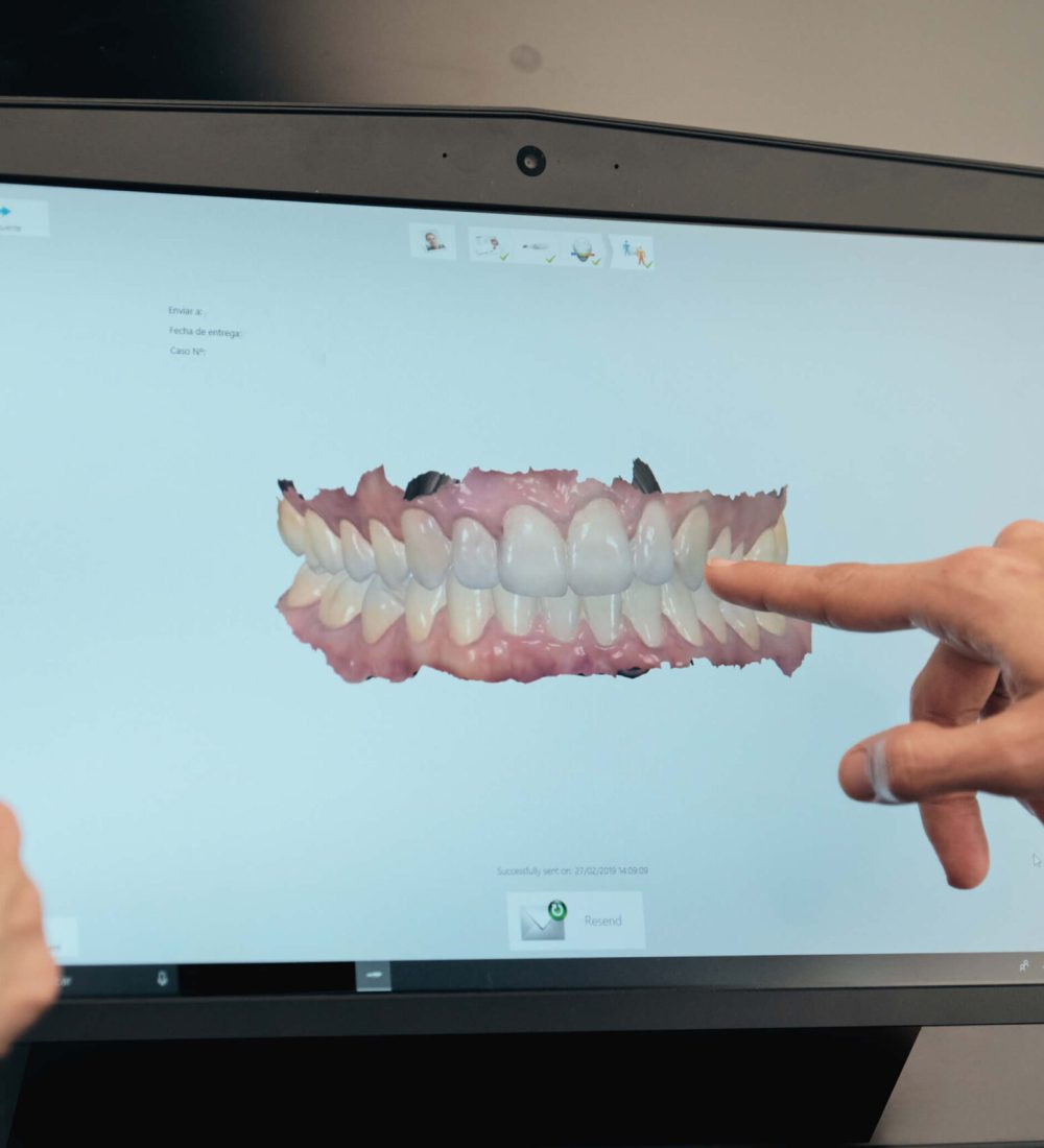 crop-dentist-showing-teeth-scan-to-patient-2025-04-03-01-45-19-utc (1)
