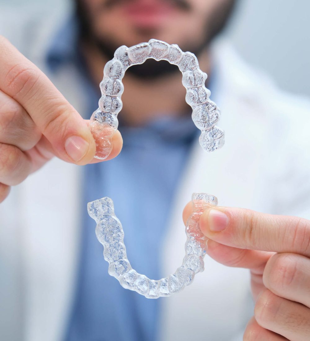 unrecognizable-orthodontist-holding-trainer-dental-2025-03-13-20-05-33-utc (1)